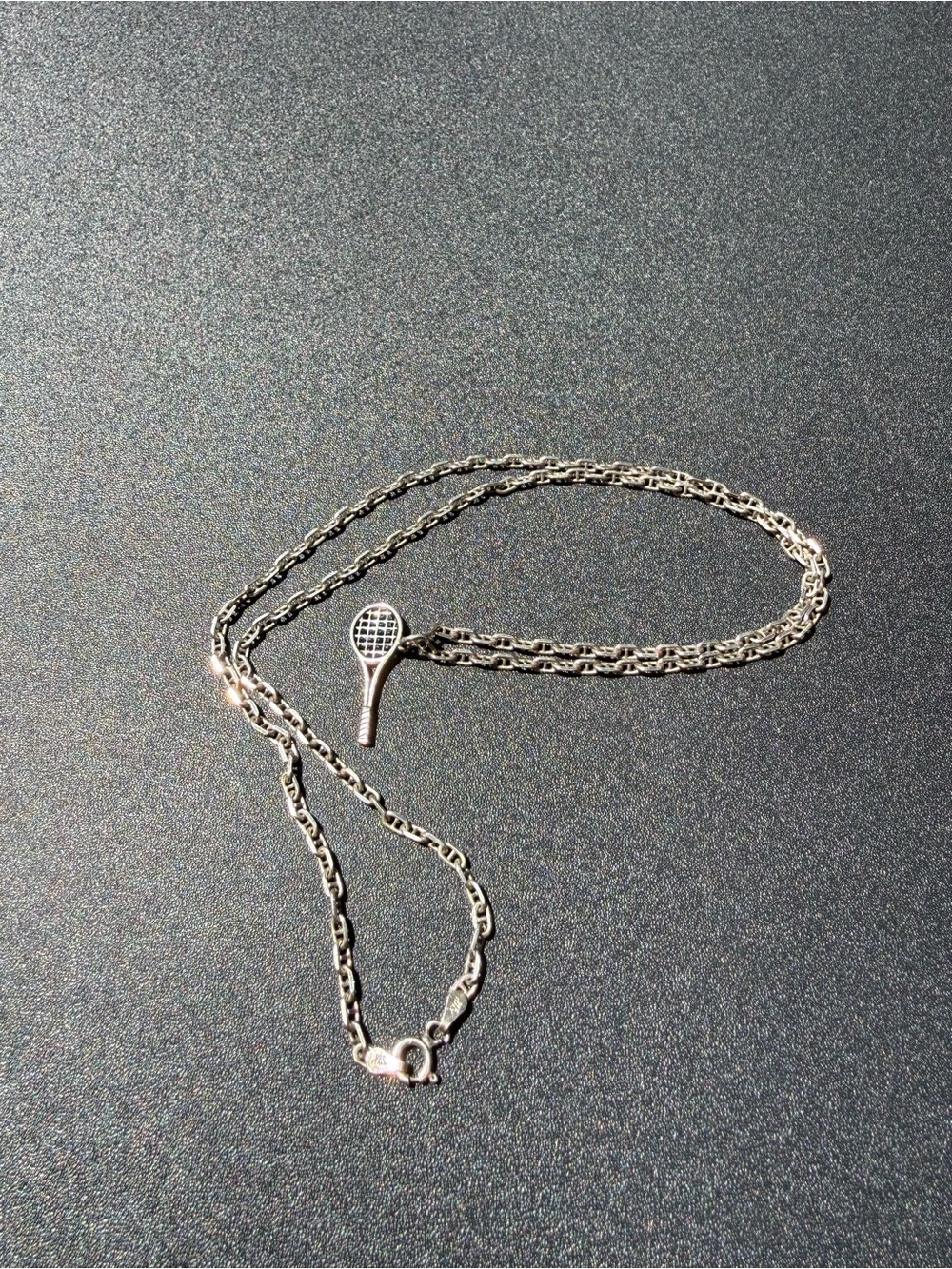 Retired James Avery tennis racket charm & 22” chain. Sterling silver.